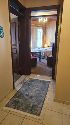 a hallway with a door leading to a bedroom at The Pashas House in Istanbul