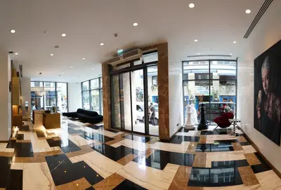 a lobby of a store with a checkered floor at Galata's Hotel in Istanbul
