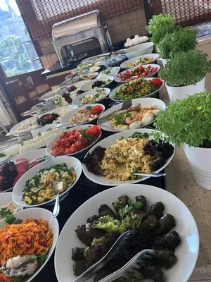 a buffet of plates of food on a table at Mehmet Bey Suites in Istanbul