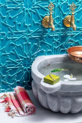 a bathroom with a sink with a plate of food at Danis Hotel & Spa Istanbul - Old City in Istanbul