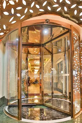 a large glass window in a building with a ceiling at Danis Hotel & Spa Istanbul - Old City in Istanbul