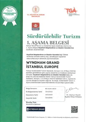 a green and white document with a certificate at Wyndham Grand Istanbul Europe in Istanbul
