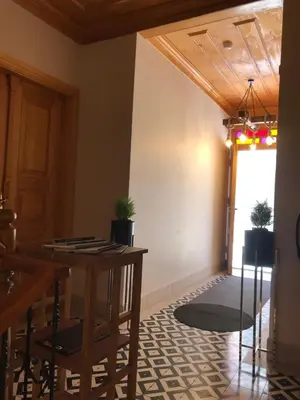 a dining room with a table and a window at Green Mansion in Istanbul