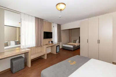 a hotel room with a bed and a television at Yez Boutique Hotel in Istanbul