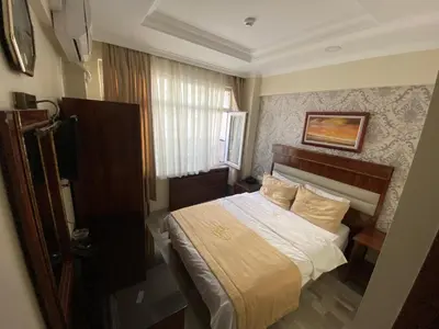 a hotel room with a bed in a bedroom at Elit Palace Hotel in Istanbul