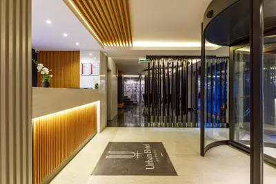 a lobby with a sign on the floor of a building at Urban Hotel Bomonti in Istanbul