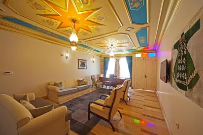 a living room with a ceiling with stars on it at Azade Premier Hotel in Istanbul