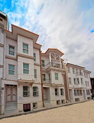 a large white building on the side of a street at Azade Premier Hotel in Istanbul