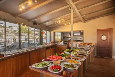 a buffet line with many plates of food at Azade Premier Hotel in Istanbul