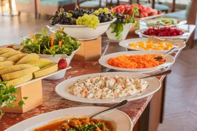 a buffet with many plates of food on a table at Azade Premier Hotel in Istanbul