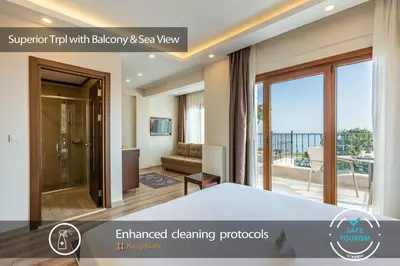 a view of a room with a bed and a balcony at MENAR HOTEL&SUITES -Old City Sultanahmet in Istanbul