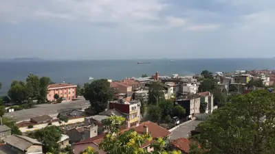 a city with buildings and the ocean in the background at Mytra Hotel in Istanbul
