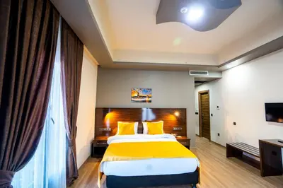 a hotel room with a bed and a television at Mugwort Hotel & Spa in Istanbul