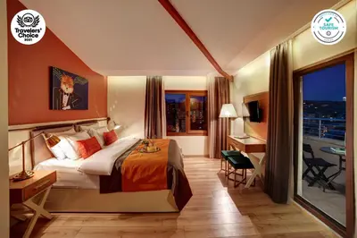 a hotel room with a bed and a desk at The Fox Hotel in Istanbul