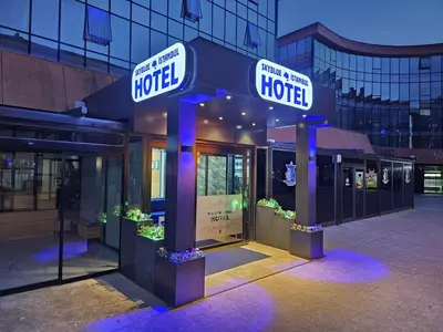 a hotel sign in front of a building at SKYBLUE İSTANBUL HOTEL in Istanbul