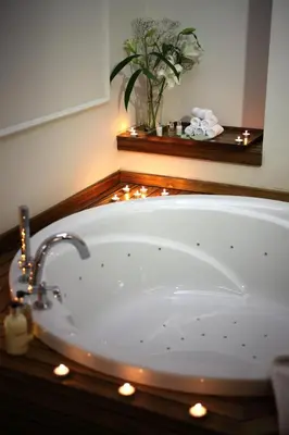 a bath tub with lights in a bathroom at Corinne Art & Boutique Hotel in Istanbul