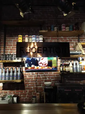 a brick wall with a sign that reads hotachi at The Wolf Hotel in Istanbul