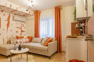 a living room with a couch and a table at Lord Morgan & Exclusive Design Residence Nişantaşı in Istanbul