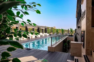 a view of a swimming pool at a resort at Black Bird Thermal Hotel & SPA in Gokcedere