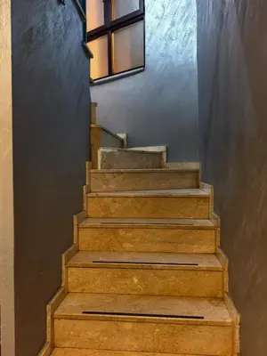 a set of stairs with a window on the wall at Old City Pansiyon in Istanbul