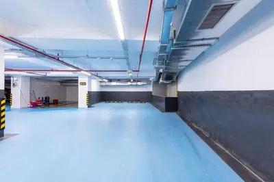 an empty room with blue floors in a building at Hotel Boursier 2 & Spa in Istanbul