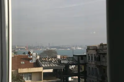 a view of a city with a view of the water at Ligos in Istanbul