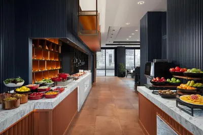 a buffet line with fruits and vegetables on display at Delta Hotels by Marriott Istanbul Vadi in Istanbul