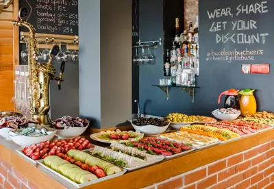 a buffet with different types of food on a table at Cheers Lighthouse in Istanbul