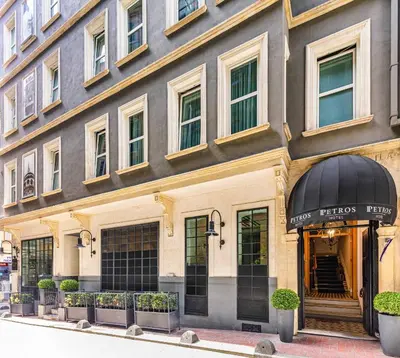 a facade of a building with a store at Petros Hotel in Istanbul