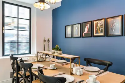 a dining room with a table and chairs at Petros Hotel in Istanbul