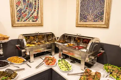 a buffet with many different types of food at Royal Bosphorus Hotel & SPA Hamam in Istanbul