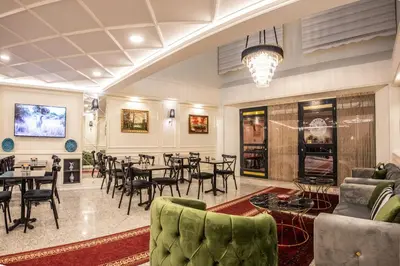a restaurant with tables and chairs in a room at Royal Bosphorus Hotel & SPA Hamam in Istanbul