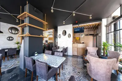 a dining room with a table and chairs at RUSH HOTEL İSTANBUL in Istanbul
