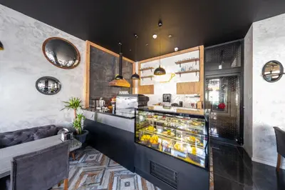 a restaurant with a counter with food behind it at RUSH HOTEL İSTANBUL in Istanbul