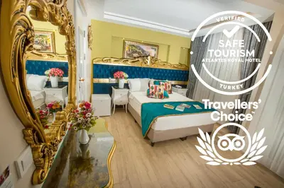 a hotel room with a bed and a mirror at Atlantis Royal Hotel in Istanbul