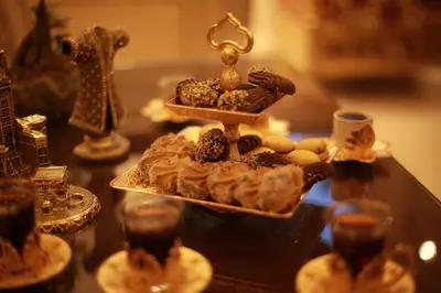 a table with a tray of pastries on a table at Atlantis Royal Hotel in Istanbul