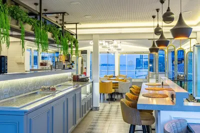 a restaurant with a view of the ocean at Best Point Suites Old City,Istanbul in Istanbul