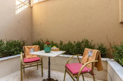 two chairs and a table on a patio at Best Point Suites Old City,Istanbul in Istanbul