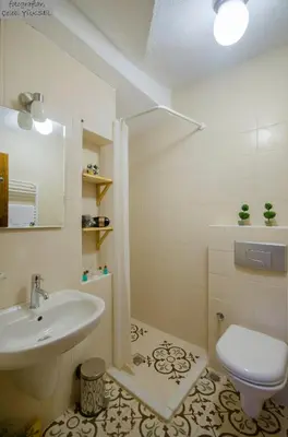 a bathroom with a sink and a toilet at Ağva Piassa Otel in Agva