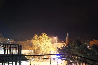a view of a city at night at Hotel Ipekyolu in Sapanca