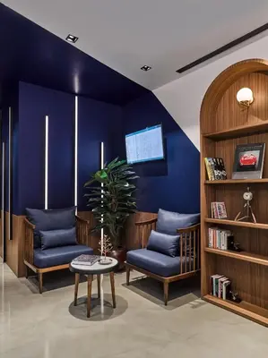 a blue room with two blue chairs and a table at Kepler Club Sabiha Gökçen Airport - International Transit Area in Istanbul