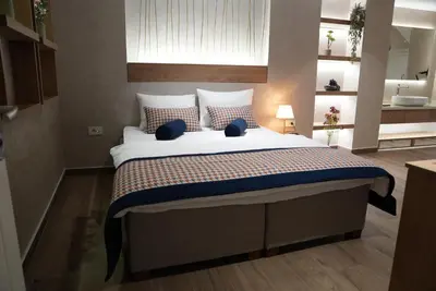 a bedroom with a large bed in a room at Ooda Rooms Kadıköy in Istanbul
