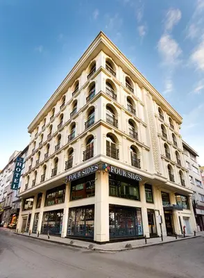 a large building on the corner of a street at Four Sides Sisli in Istanbul