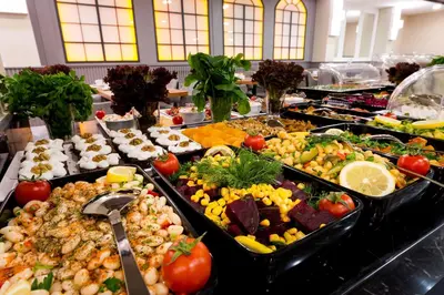 a buffet line with many different types of food at Four Sides Sisli in Istanbul