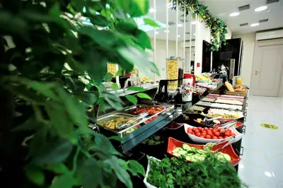 a buffet line with many different types of food at OMMA HOTEL in Istanbul