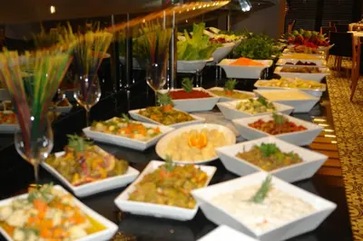 a buffet with many plates of food on a table at Istanbul Dora Hotel in Istanbul