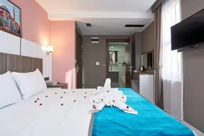 a hotel room with a bed with a starfish on it at Renzo Hotel - Special Category in Istanbul