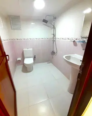 a bathroom with a toilet and a sink at Ozbekler Hotel-Old City in Istanbul