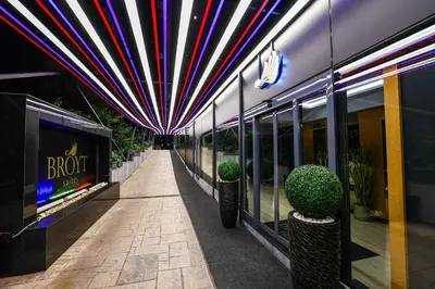 a hallway of a building with a tunnel with plants at Broyt Hotel in Istanbul