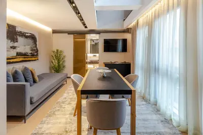a living room with a couch and a table at Broyt Hotel in Istanbul